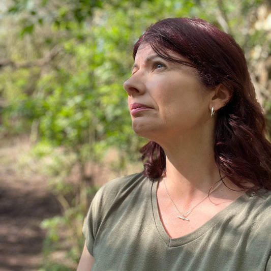 Women Wearing Organic Textured Silver Hoop Earrings and T Bar Necklace