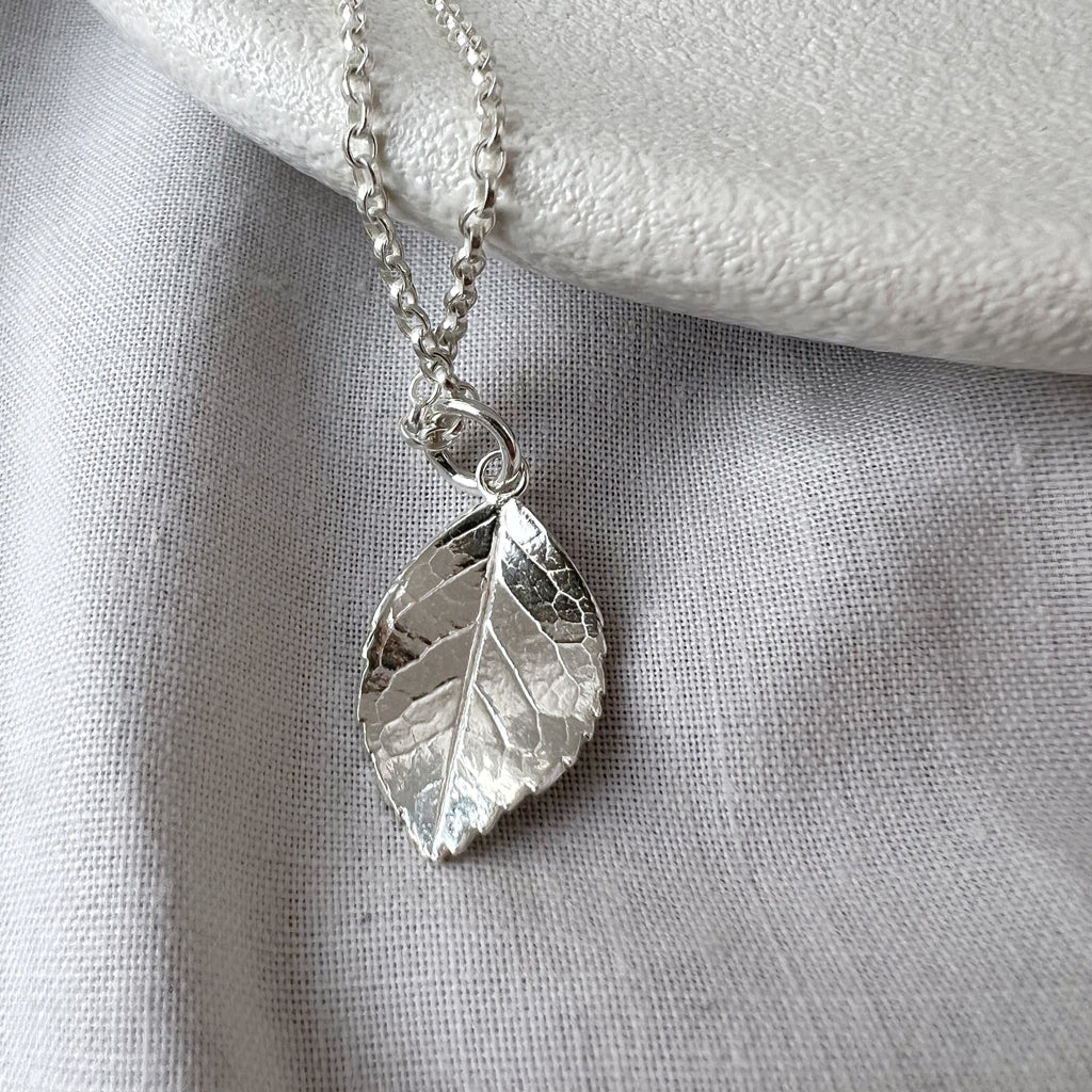 Silver Rose Leaf Necklace on white background