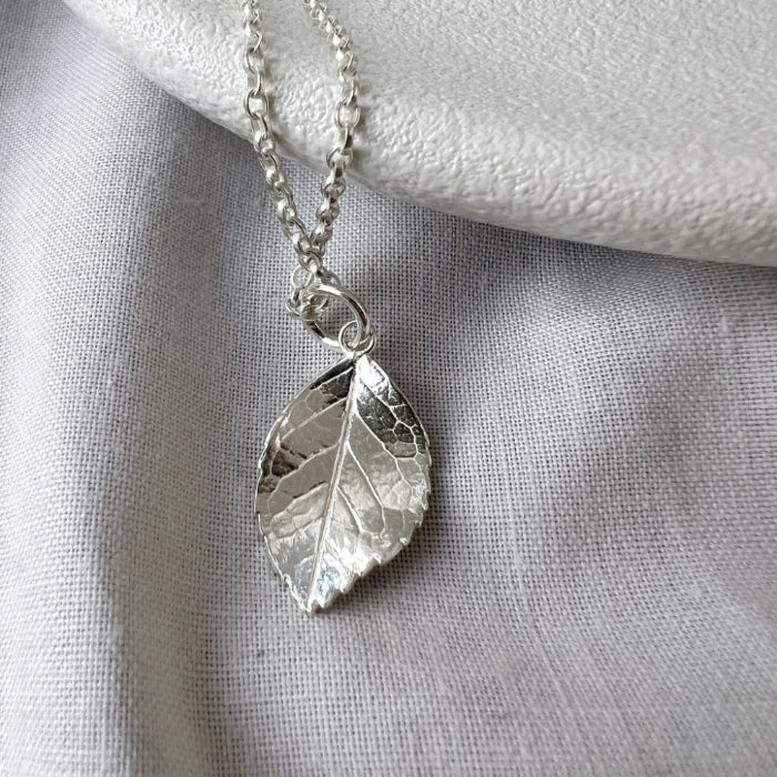Silver Rose Leaf Necklace on white background