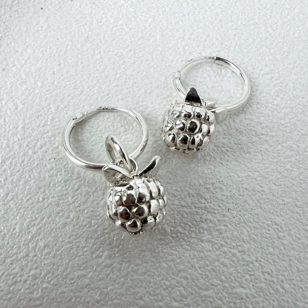 Silver blackberry earrings on white background