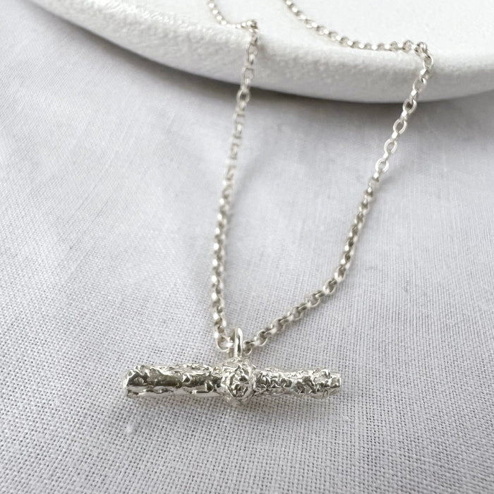 Textured Organic Style T Bar Necklace on White Background