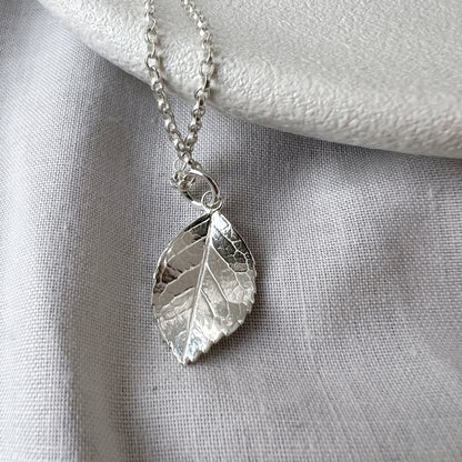 Silver Rose Leaf Necklace on white background