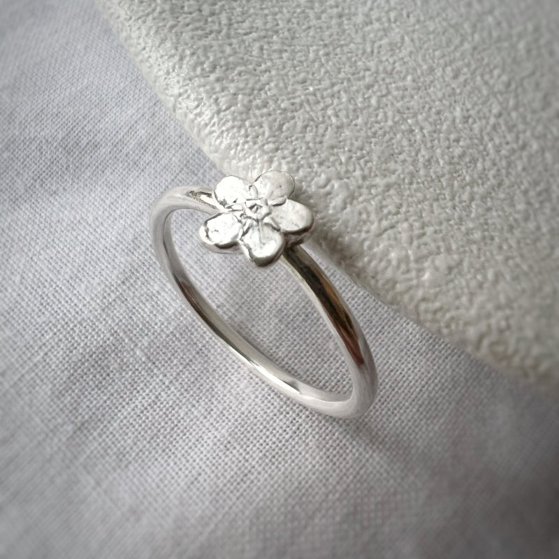 Single Silver Forget Me Not on Silver Band with White Background