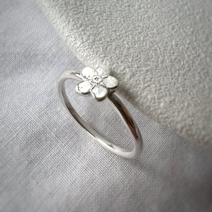 Single Silver Forget Me Not on Silver Band with White Background