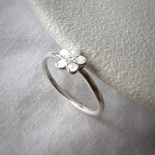Single Silver Forget Me Not on Silver Band with White Background