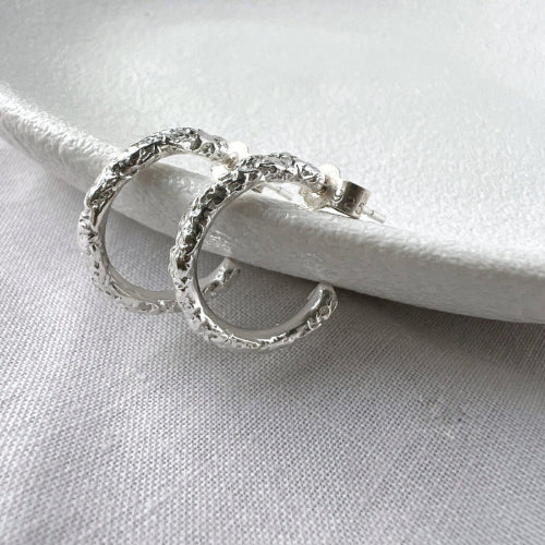Silver Organic Textured Hoop Earrings on White Background